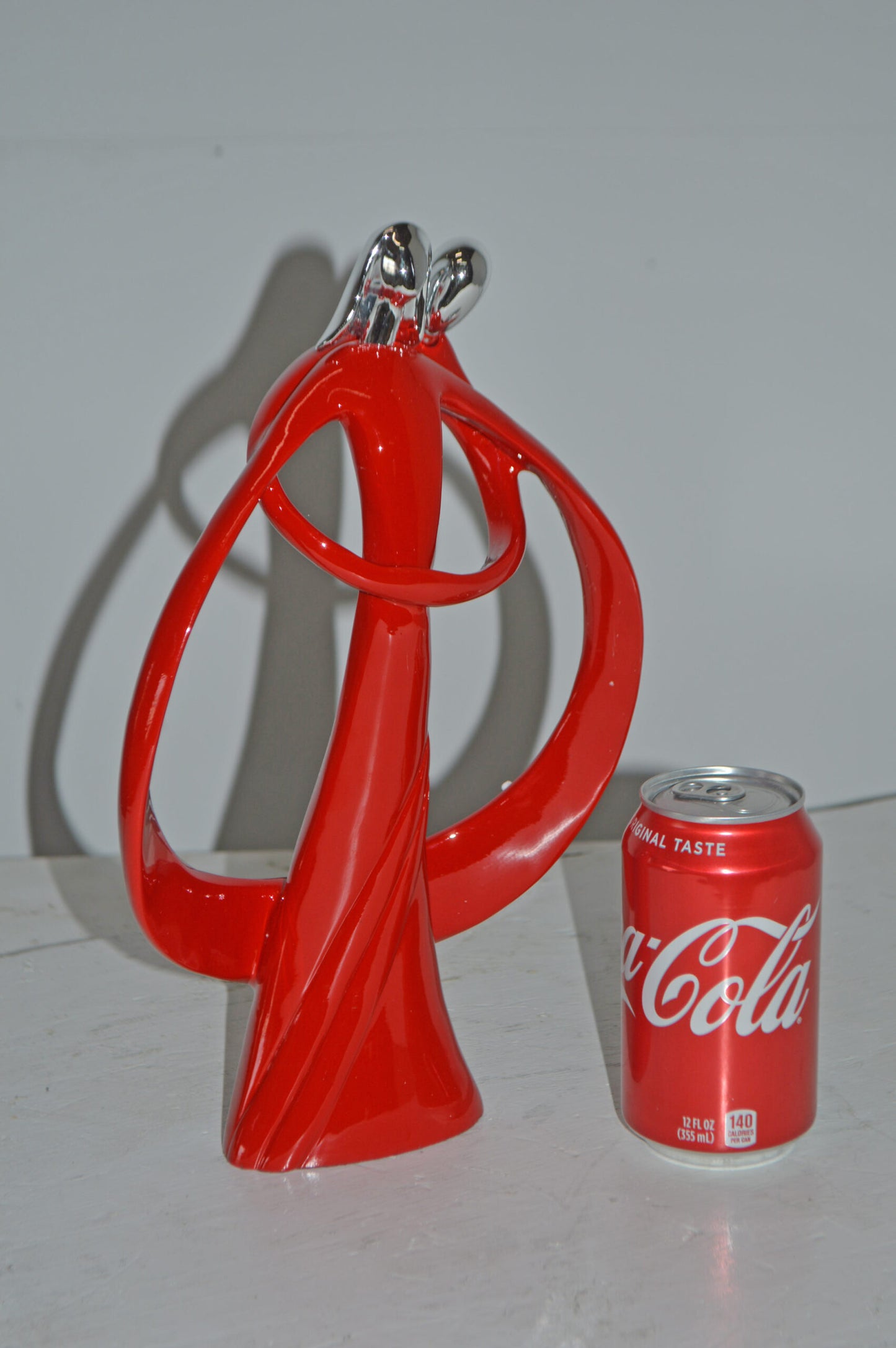 Modern Art of a Couple Hugging Red Chrome Resin Statue - Size: 8"L x 2"W x 12"H
