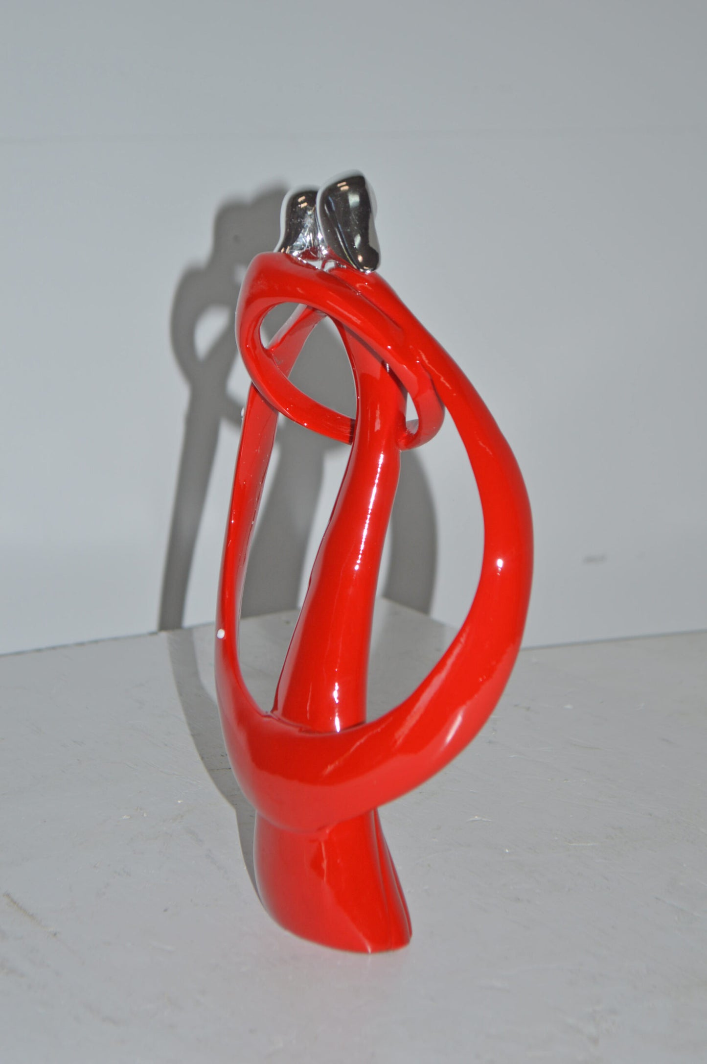 Modern Art of a Couple Hugging Red Chrome Resin Statue - Size: 8"L x 2"W x 12"H