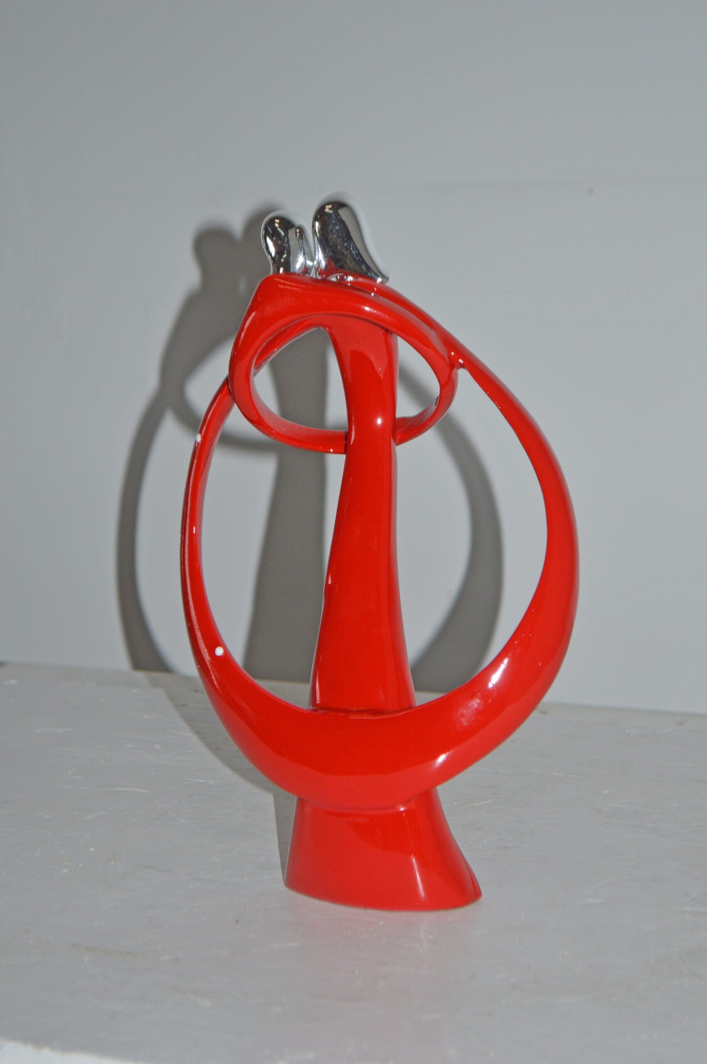 Modern Art of a Couple Hugging Red Chrome Resin Statue - Size: 8"L x 2"W x 12"H