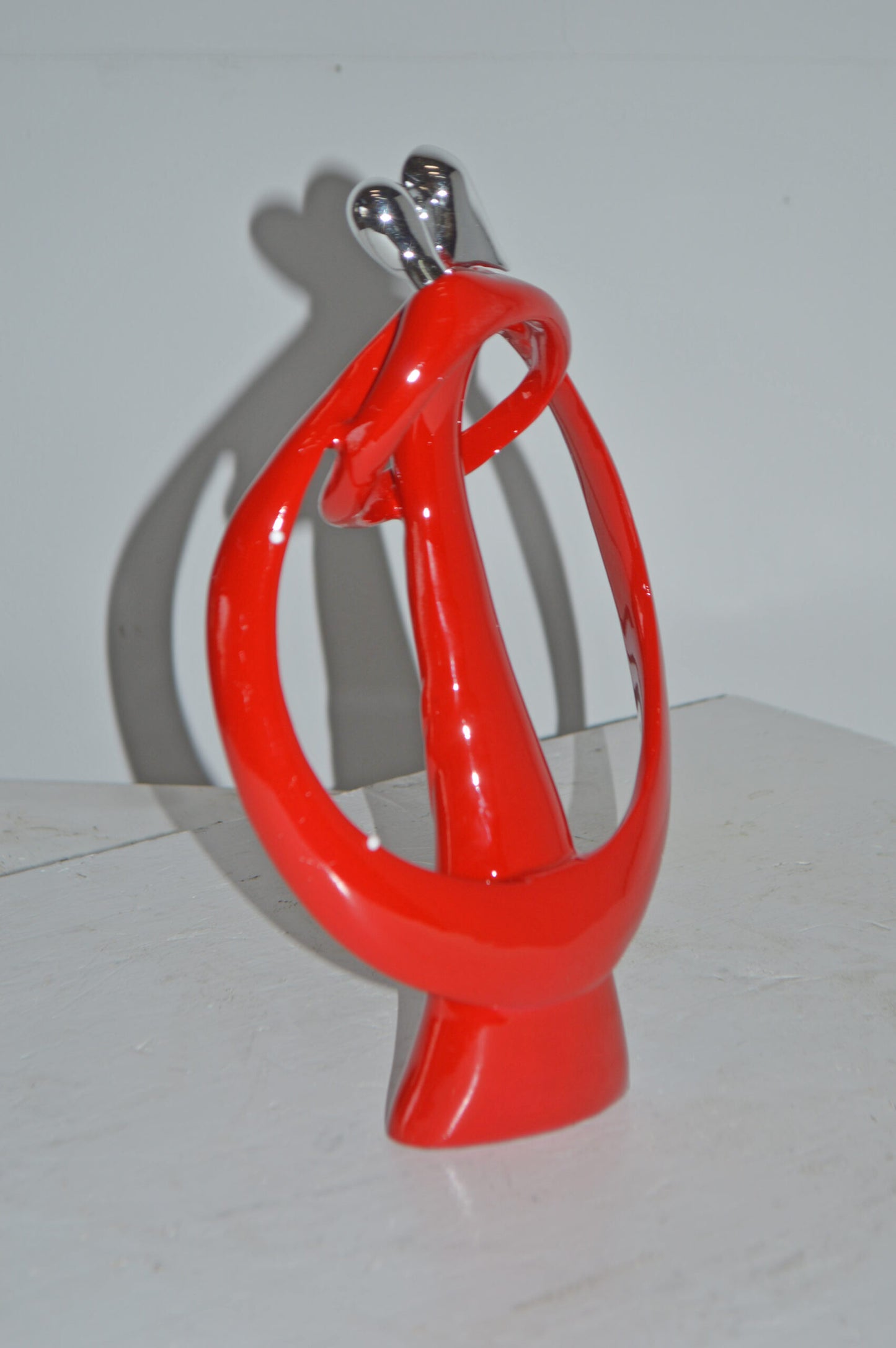 Modern Art of a Couple Hugging Red Chrome Resin Statue - Size: 8"L x 2"W x 12"H