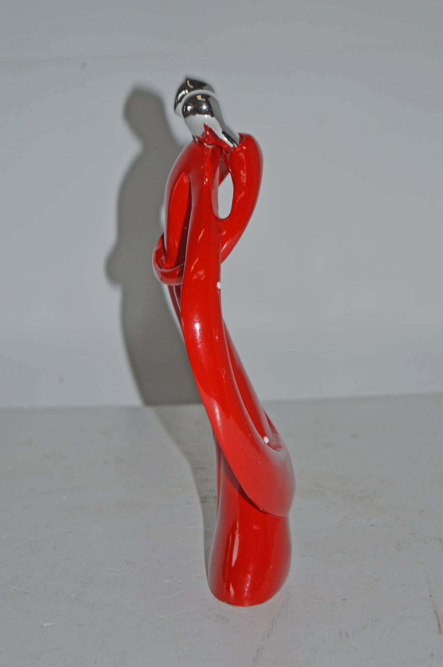 Modern Art of a Couple Hugging Red Chrome Resin Statue - Size: 8"L x 2"W x 12"H