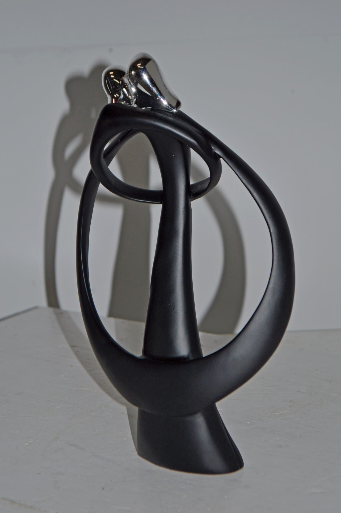 Modern Art of Couple Hugging Black Chrome Resin Statue - Size: 8"L x 2"W x 12"H