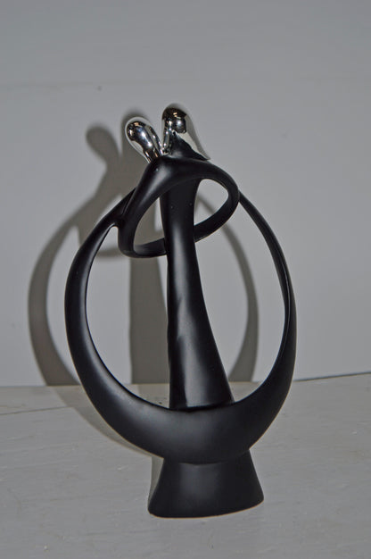 Modern Art of Couple Hugging Black Chrome Resin Statue - Size: 8"L x 2"W x 12"H