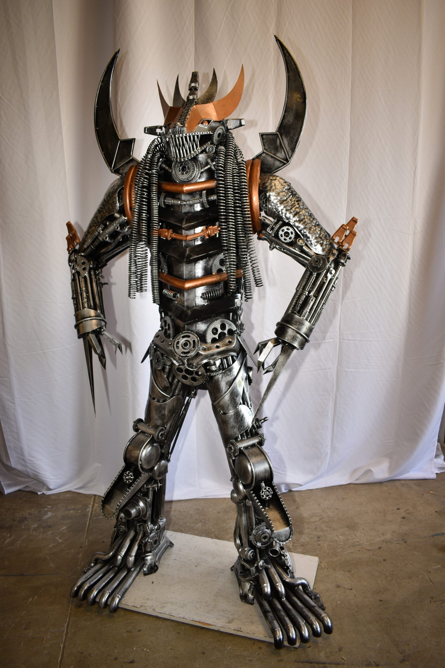 Colorfull impresive Statue of a warrier made of metal scraps 48" x 20" x 82"H
