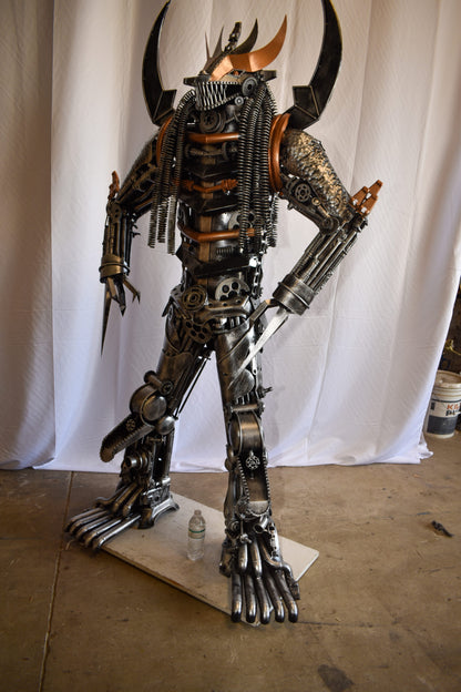 Colorfull impresive Statue of a warrier made of metal scraps 48" x 20" x 82"H