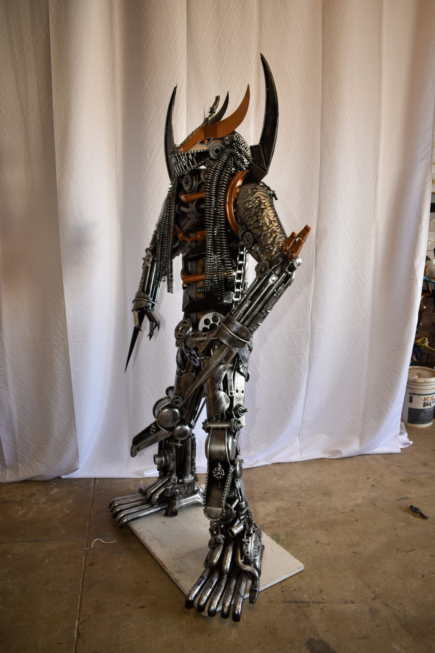 Colorfull impresive Statue of a warrier made of metal scraps 48" x 20" x 82"H