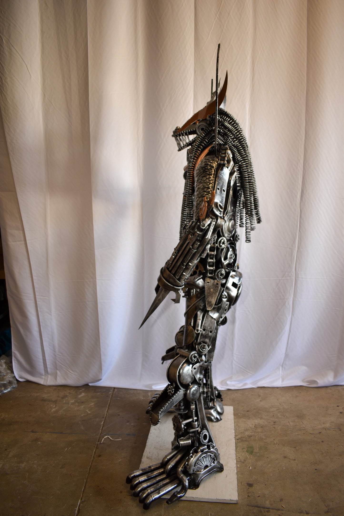Colorfull impresive Statue of a warrier made of metal scraps 48" x 20" x 82"H