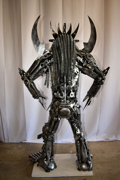 Colorfull impresive Statue of a warrier made of metal scraps 48" x 20" x 82"H