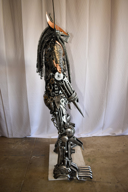 Colorfull impresive Statue of a warrier made of metal scraps 48" x 20" x 82"H