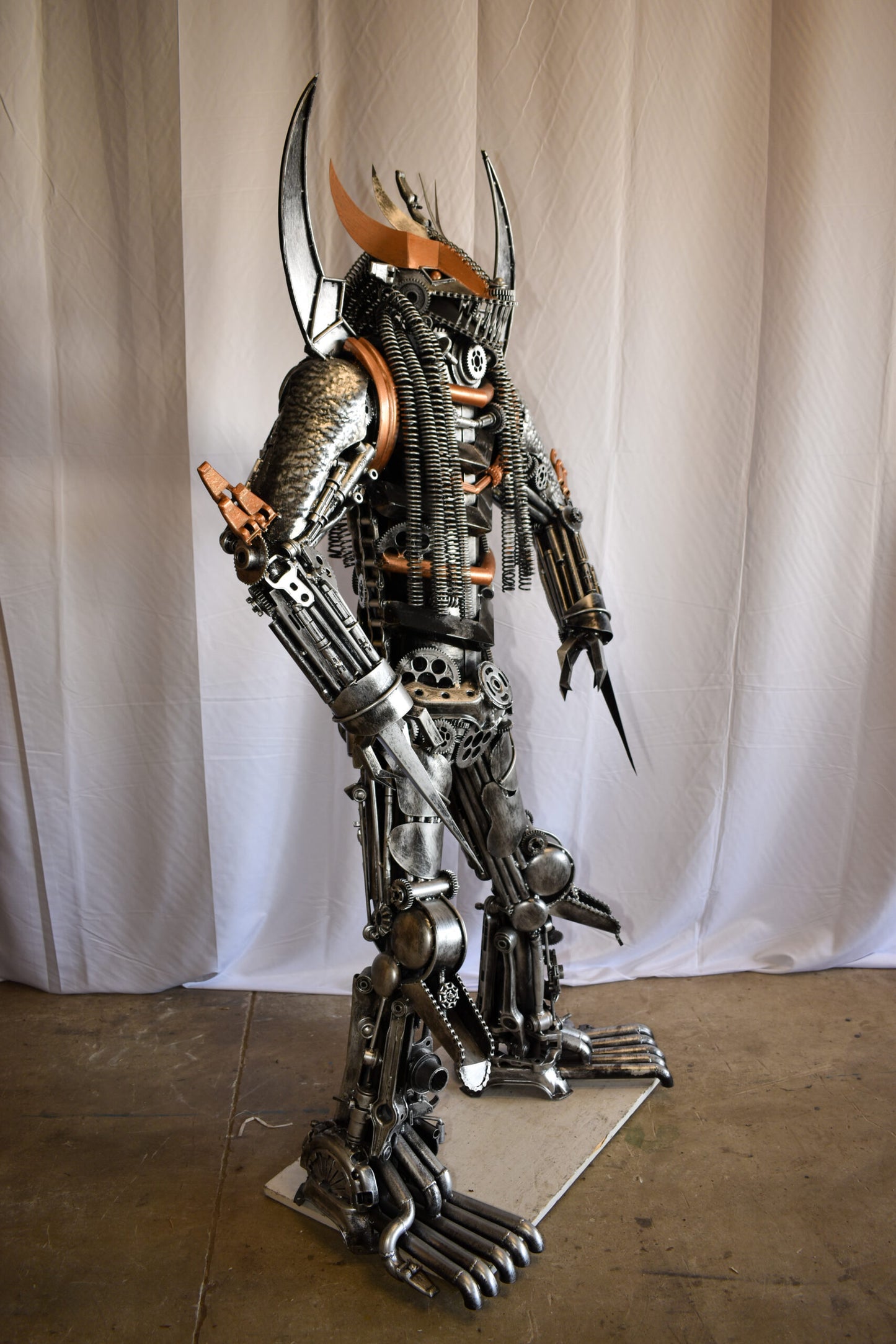 Colorfull impresive Statue of a warrier made of metal scraps 48" x 20" x 82"H