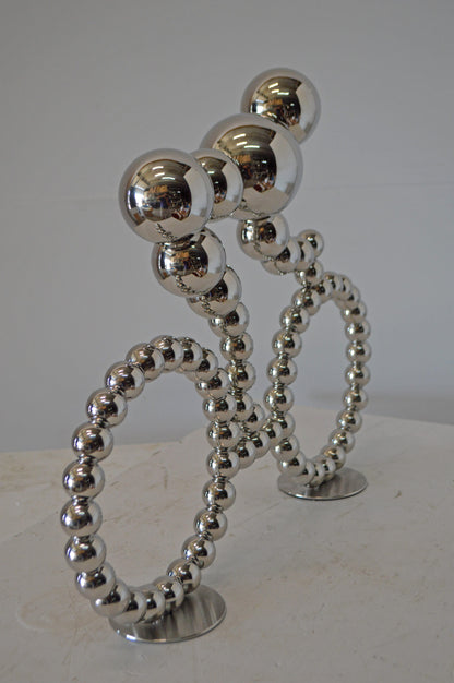 Modern Art Rider on His Bicycle Chrome Statue - Size: 22"L x 4"W x 17"H.