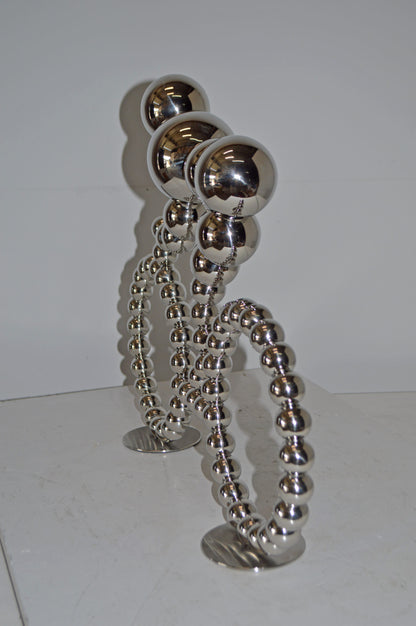 Modern Art Rider on His Bicycle Chrome Statue - Size: 22"L x 4"W x 17"H.
