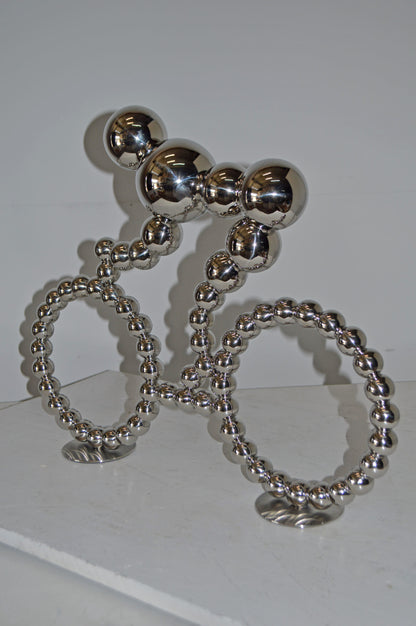 Modern Art Rider on His Bicycle Chrome Statue - Size: 22"L x 4"W x 17"H.