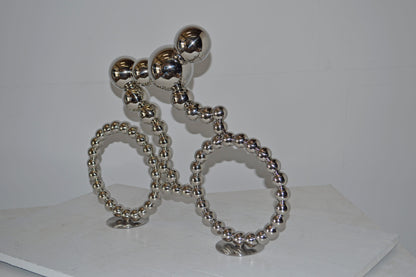 Modern Art Rider on His Bicycle Chrome Statue - Size: 22"L x 4"W x 17"H.