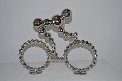 Modern Art Rider on His Bicycle Chrome Statue - Size: 22"L x 4"W x 17"H.