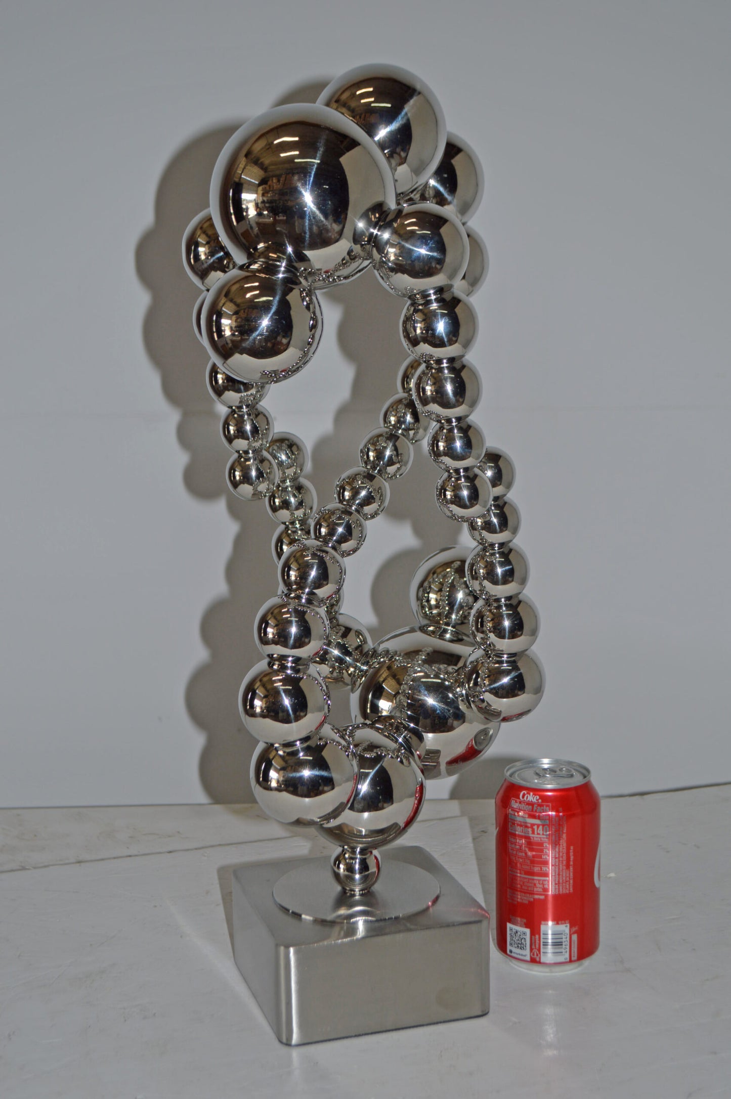Modern Art Abstract Made of Chrome Balls Statue - Size: 11"L x 10"W x 22"H.