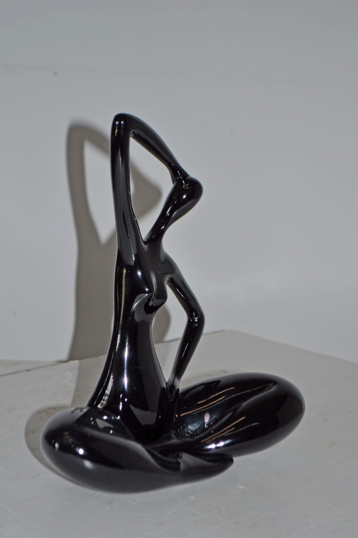 Modern Art Black Ballet Dancer Sitting Resin Statue - Size: 9"L x 5"W x 11"H.