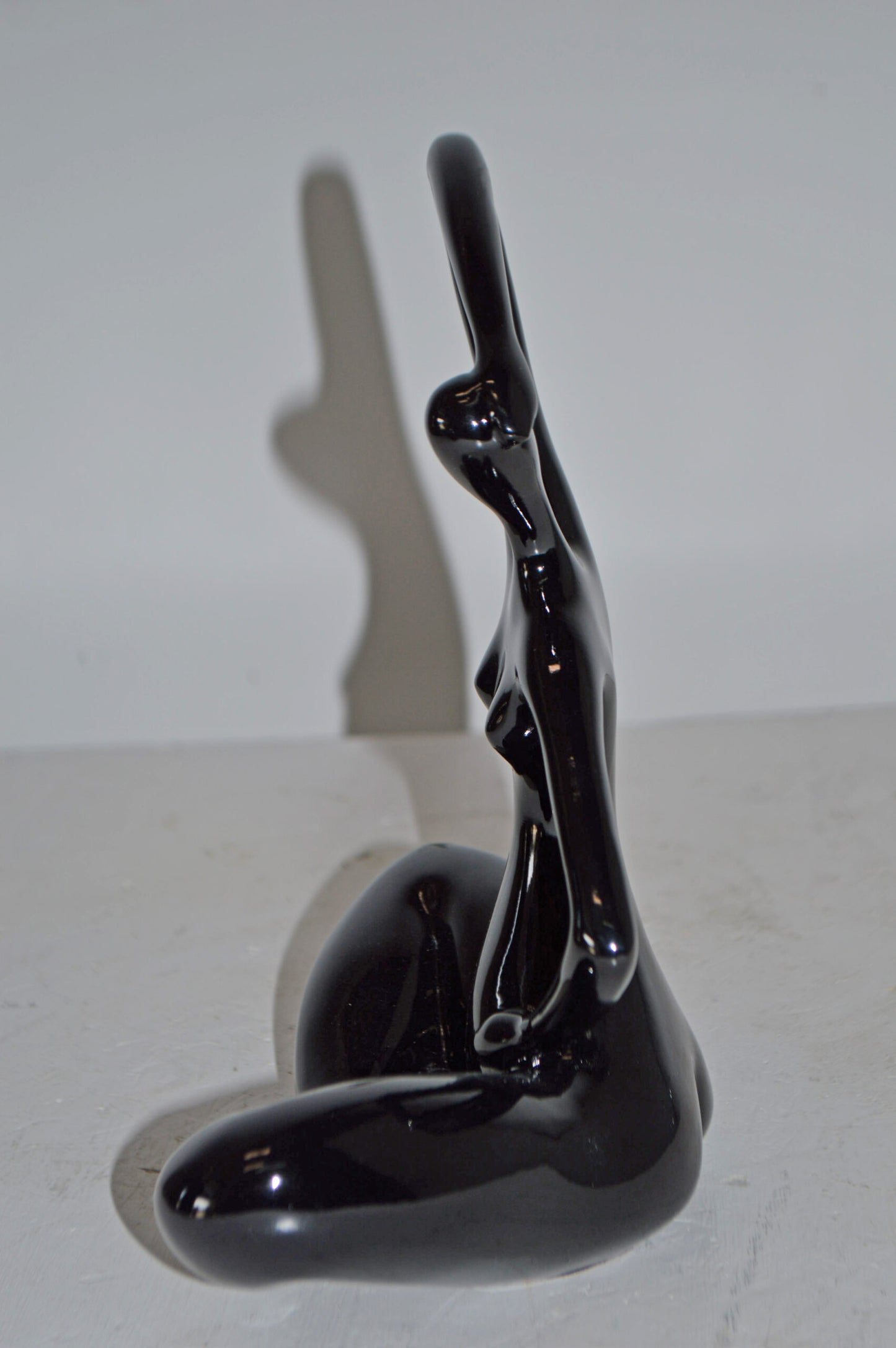 Modern Art Black Ballet Dancer Sitting Resin Statue - Size: 9"L x 5"W x 11"H.