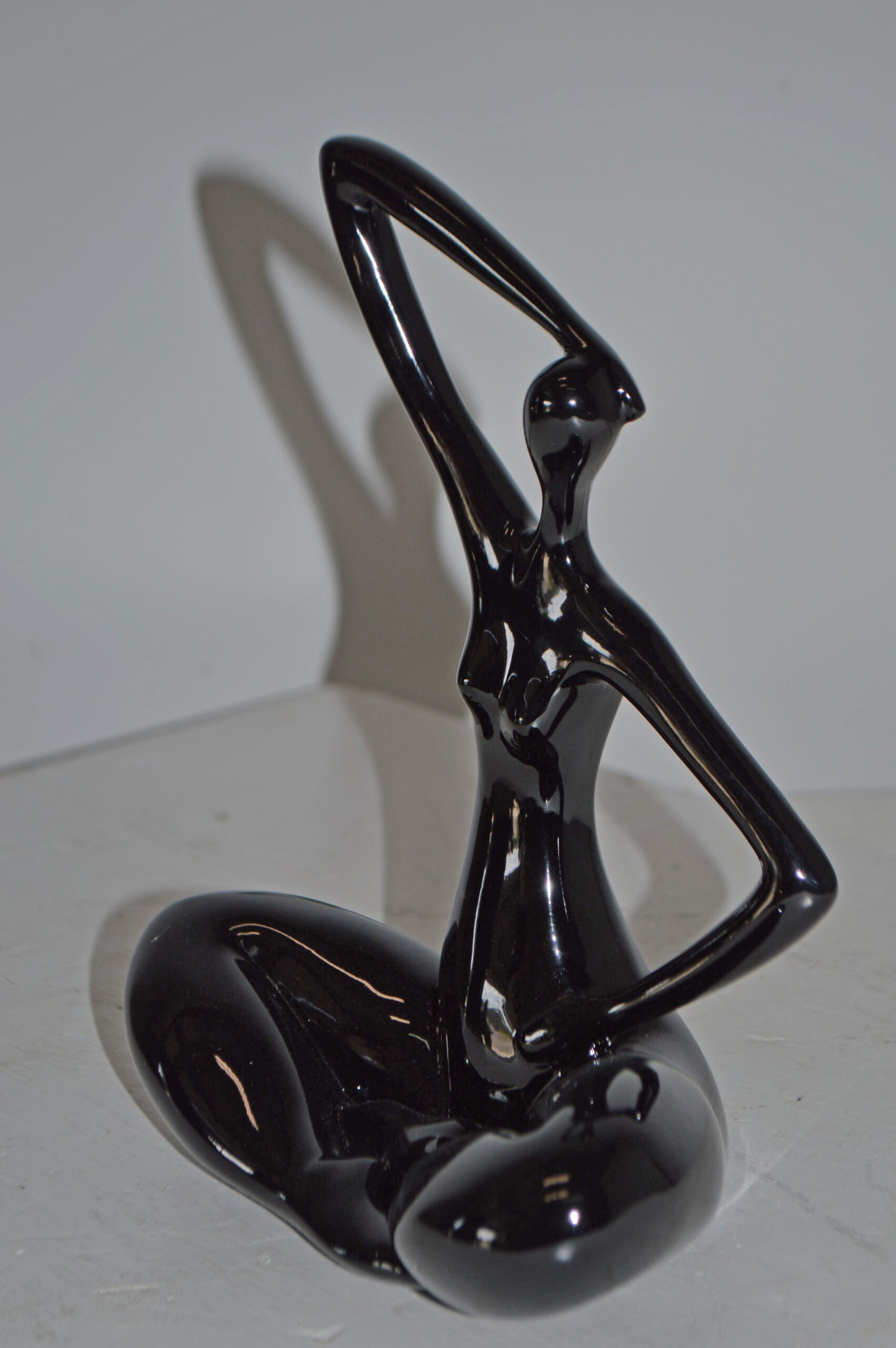 Modern Art Black Ballet Dancer Sitting Resin Statue - Size: 9"L x 5"W x 11"H.