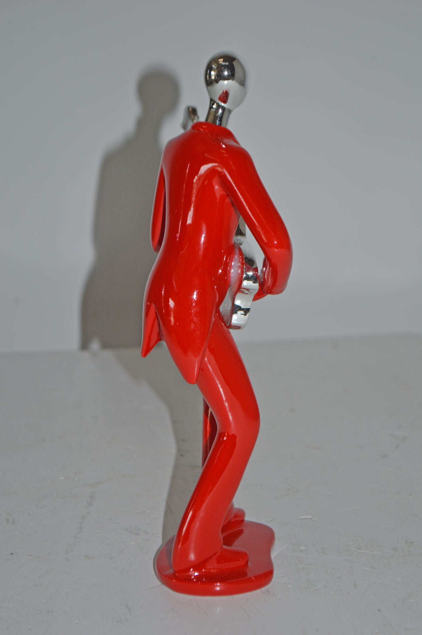 Modern Art Red and Chrome Man Playing Guitar Resin Statue - Size: 7" x 3" x 11"H