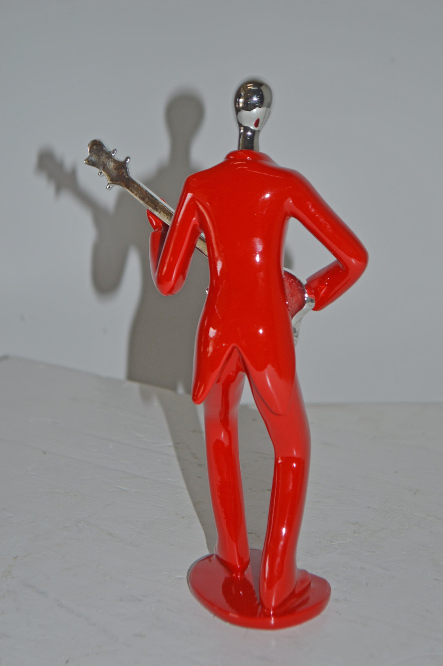 Modern Art Red and Chrome Man Playing Guitar Resin Statue - Size: 7" x 3" x 11"H