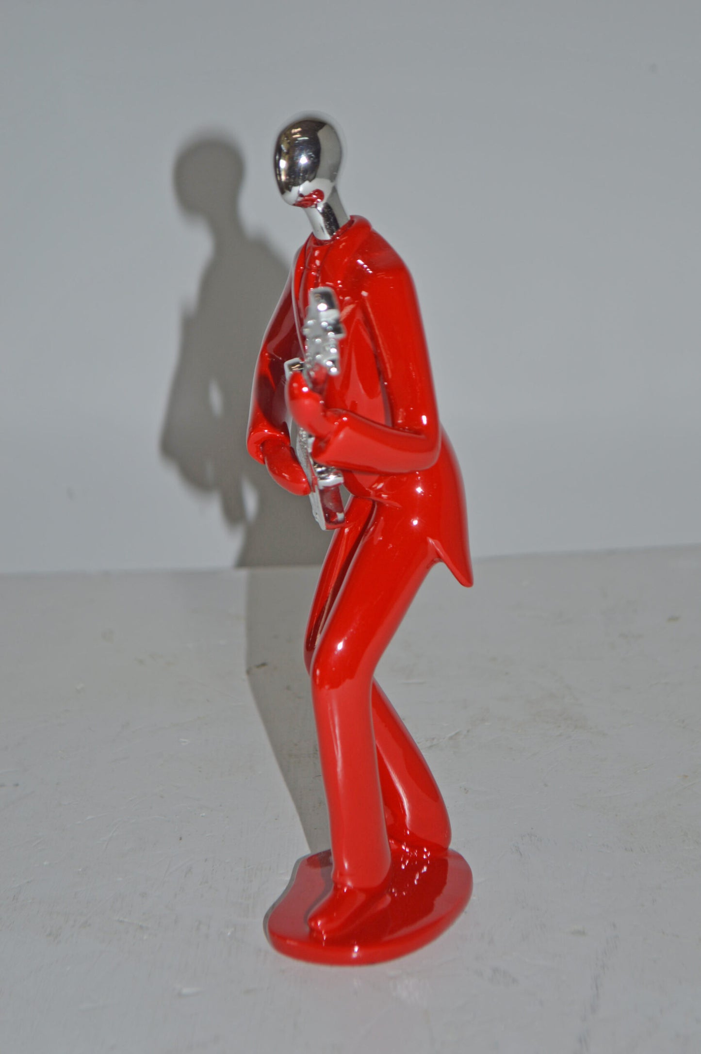 Modern Art Red and Chrome Man Playing Guitar Resin Statue - Size: 7" x 3" x 11"H