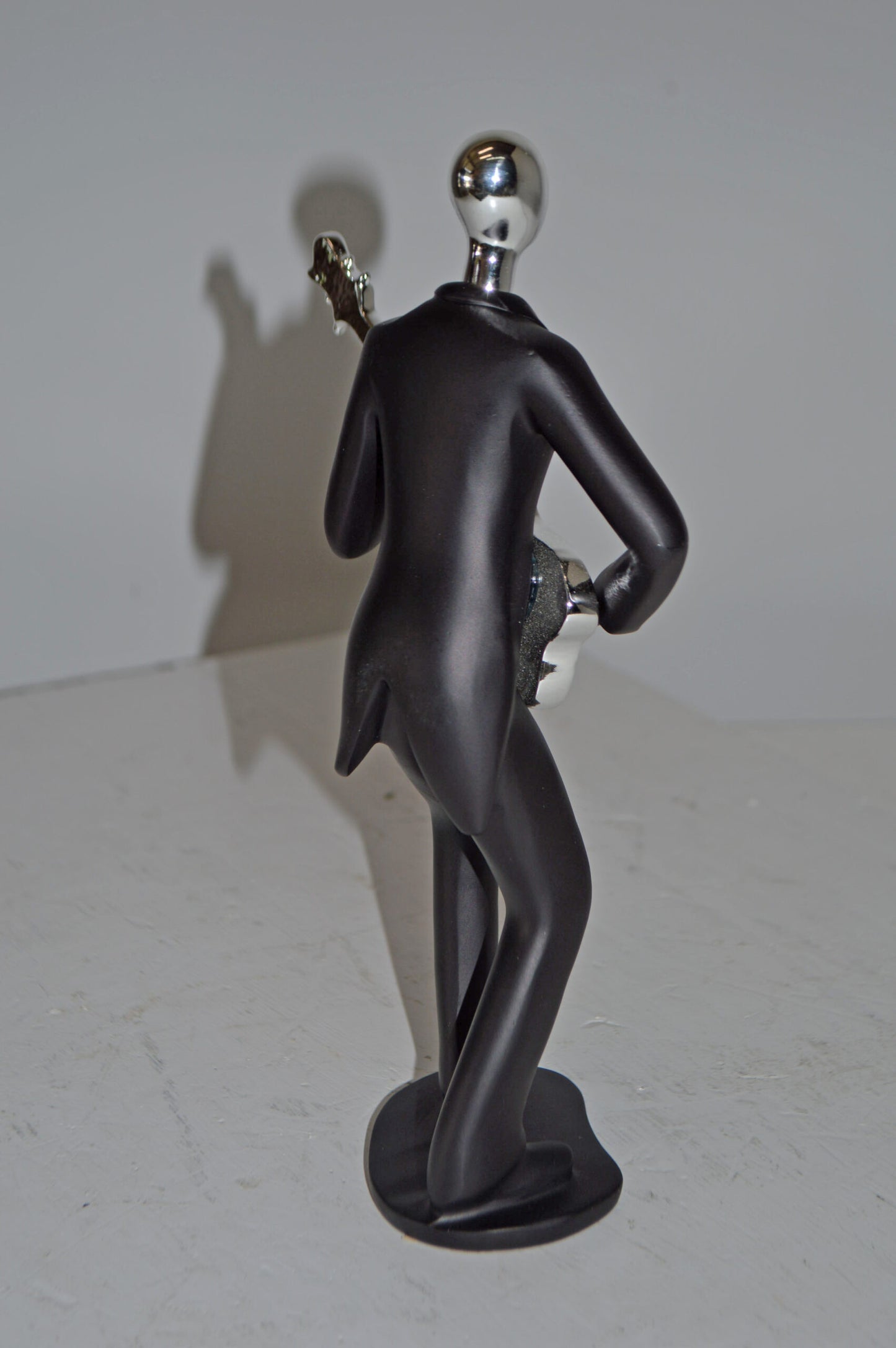 Modern Art Black and Chrome Man Playing Guitar Resin Statue - Size: 7"x3"x11"H