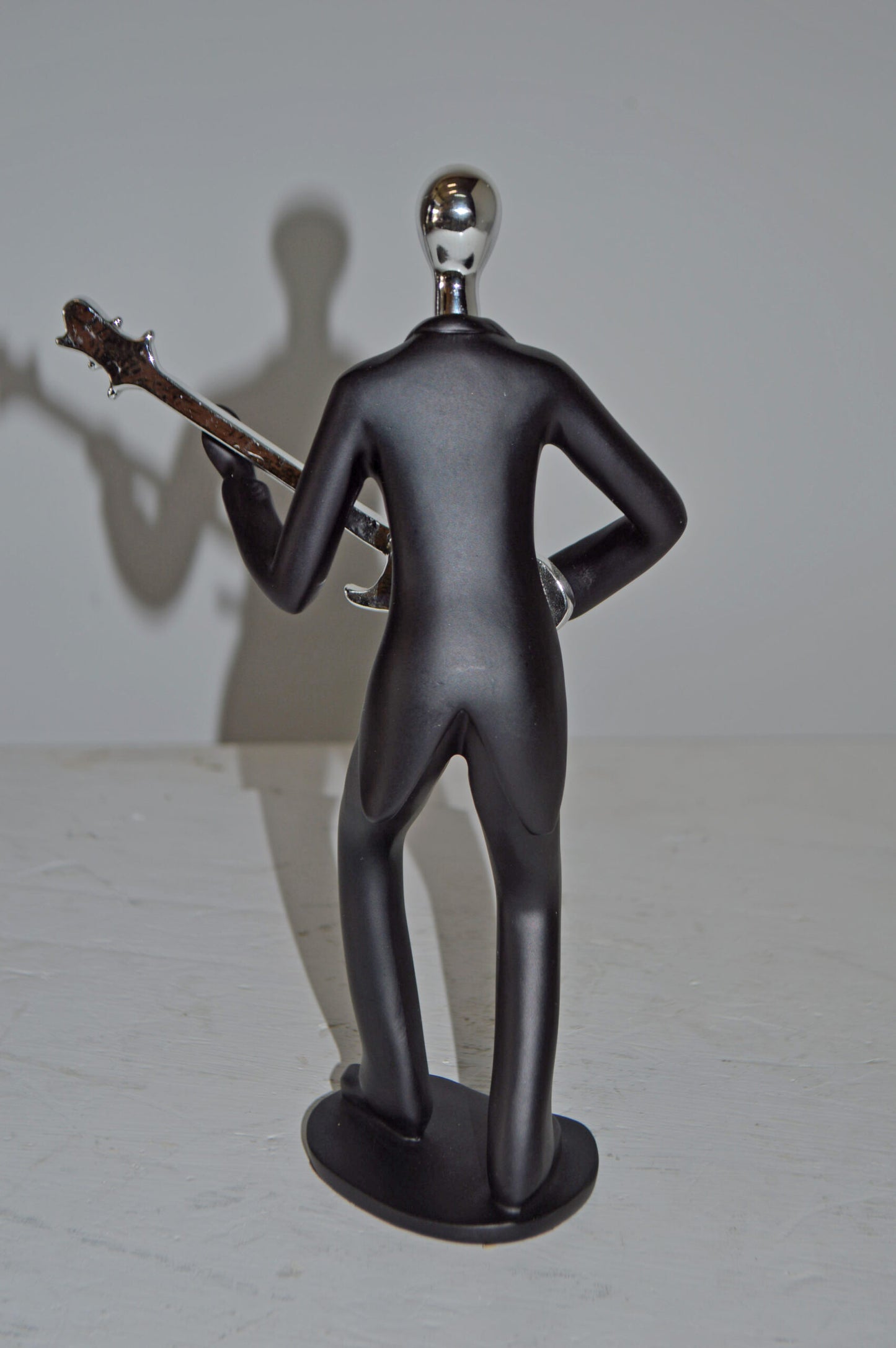 Modern Art Black and Chrome Man Playing Guitar Resin Statue - Size: 7"x3"x11"H