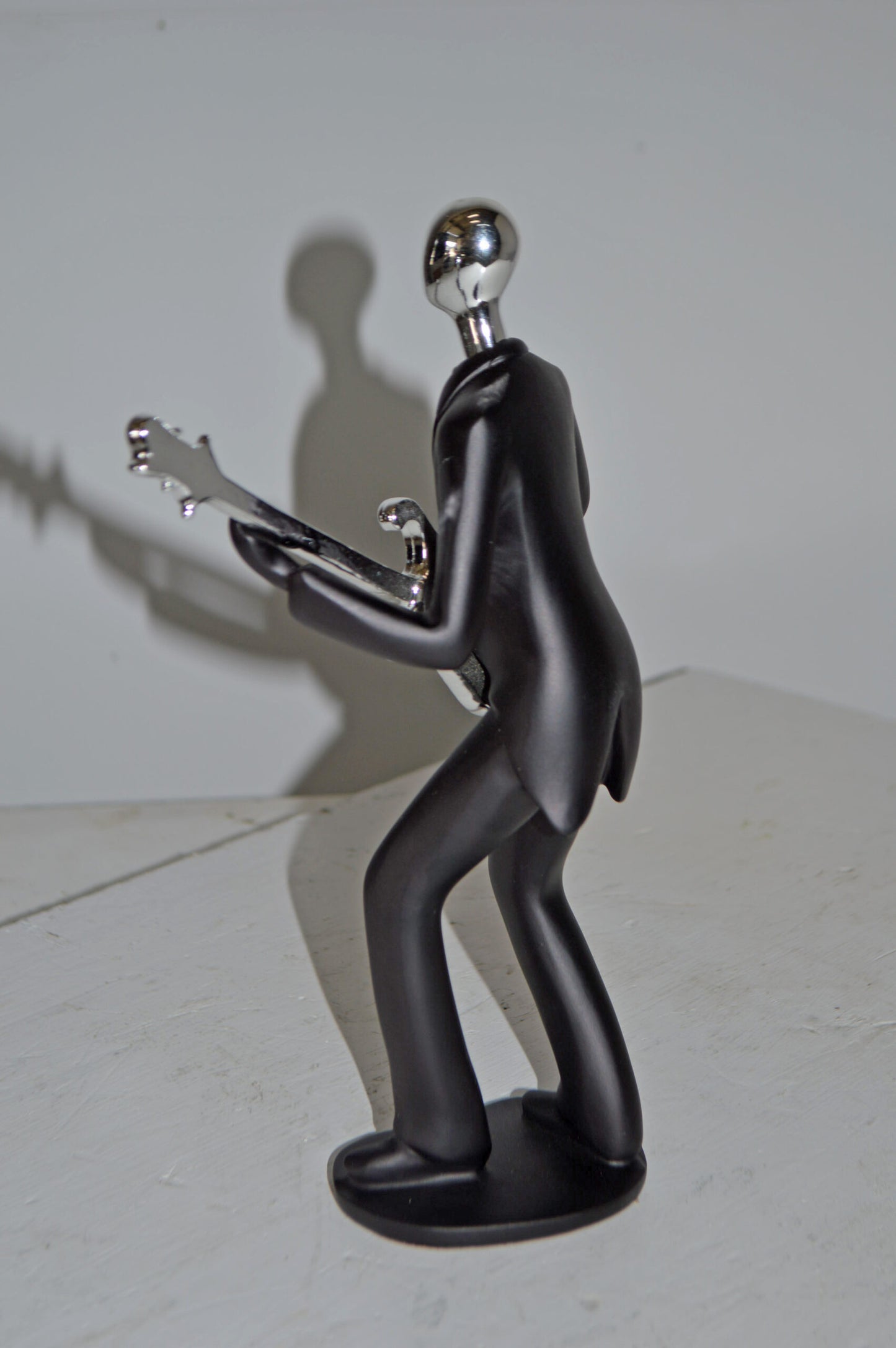Modern Art Black and Chrome Man Playing Guitar Resin Statue - Size: 7"x3"x11"H