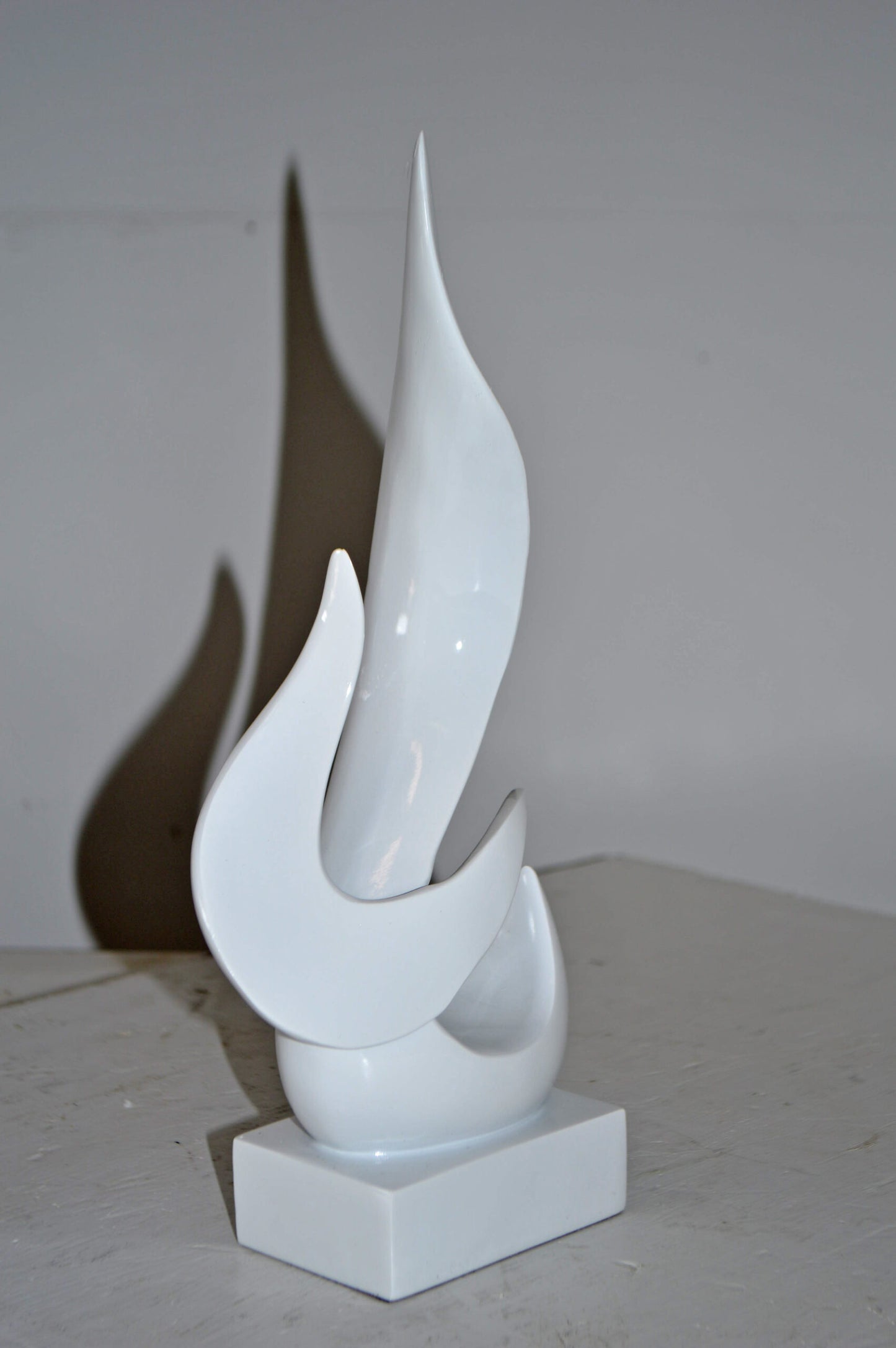 Modern Art Abstract of Fire White Resin Statue - Size: 6"L x 3"W x 12"H.