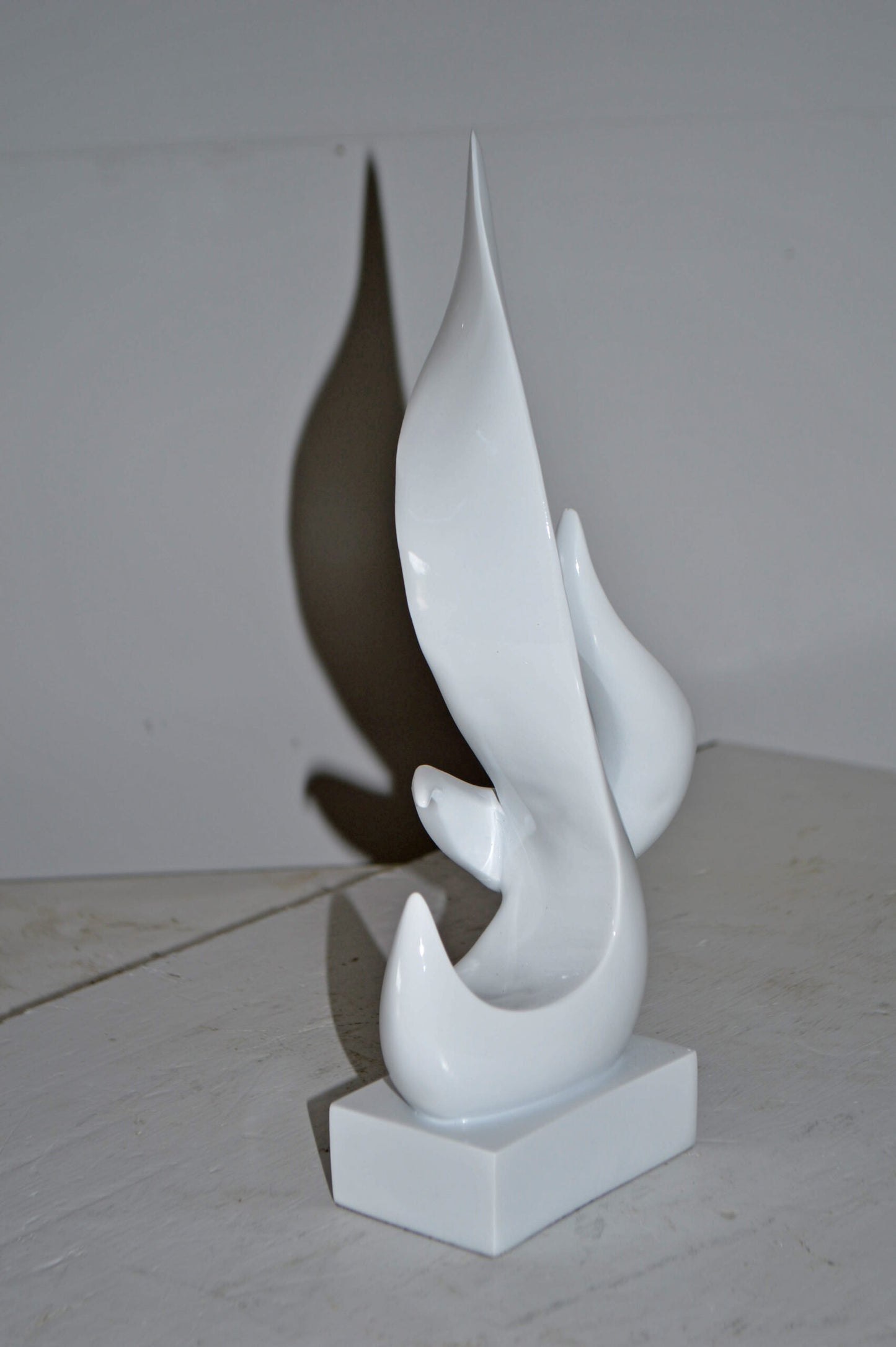 Modern Art Abstract of Fire White Resin Statue - Size: 6"L x 3"W x 12"H.