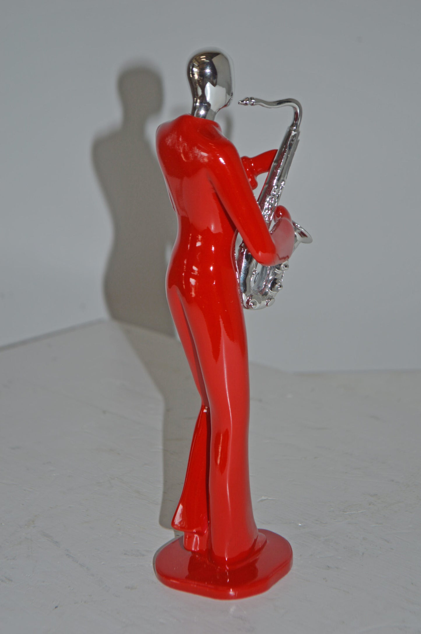 Modern Art Red and Chrome Man Play Saxophone Resin Statue - Size: 4" x 3" x 11"H