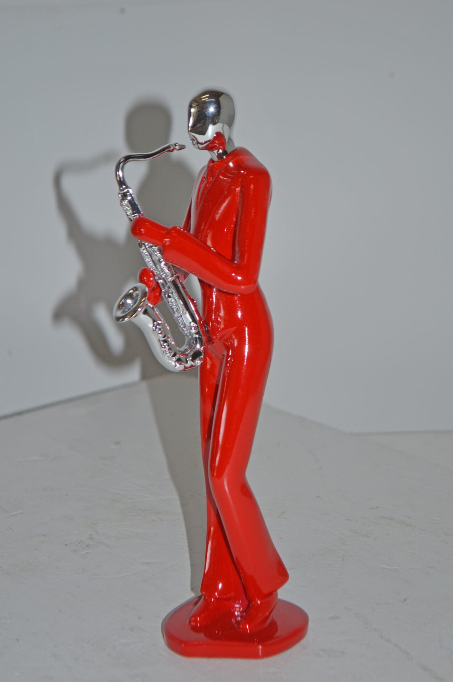 Modern Art Red and Chrome Man Play Saxophone Resin Statue - Size: 4" x 3" x 11"H