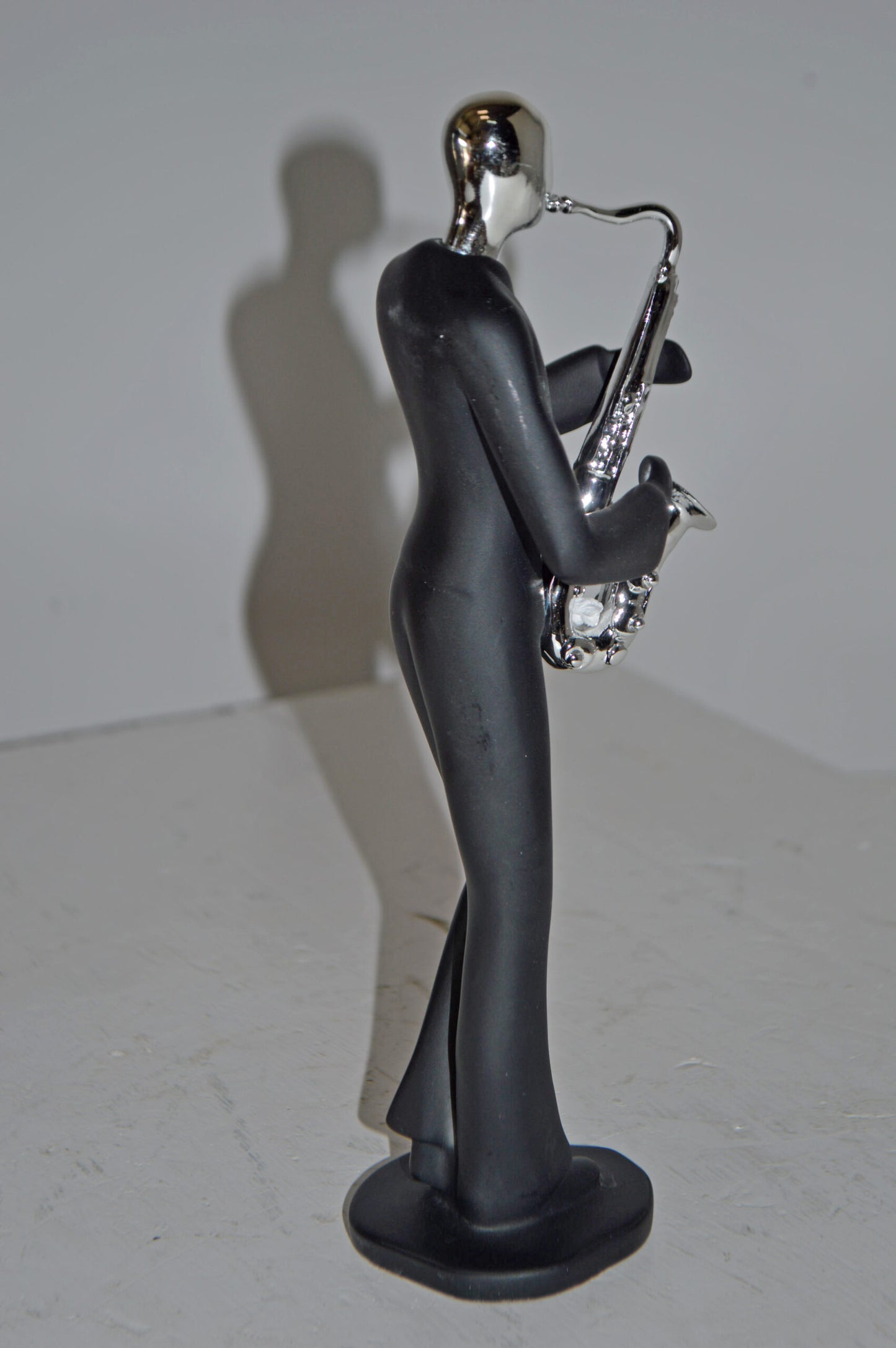 Modern Art Black and Chrome Man Play Saxophone Resin Statue - Size: 4"x3"x11"H