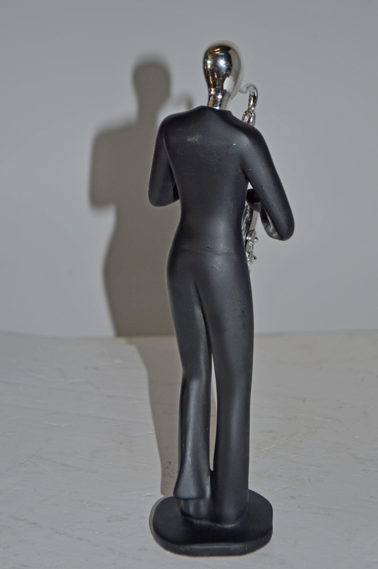 Modern Art Black and Chrome Man Play Saxophone Resin Statue - Size: 4"x3"x11"H