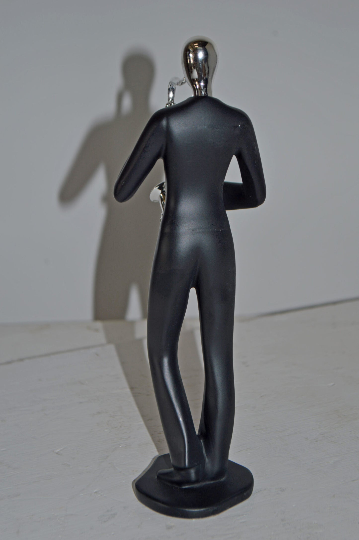 Modern Art Black and Chrome Man Play Saxophone Resin Statue - Size: 4"x3"x11"H