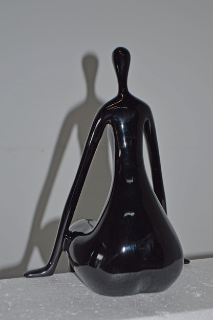 Modern Art Black Sitting on Edge Girl Made of Resin - Size: 8"L x 6"W x 15"H.