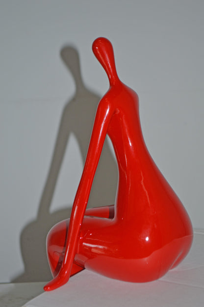 Modern Art Red Sitting on Edge Girl Made of Resin - Size: 8"L x 6"W x 15"H.