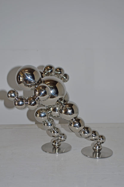 Modern Art Abstract of a Runner made of Chrome Balls - Size: 13"L x 9"W x 11"H.