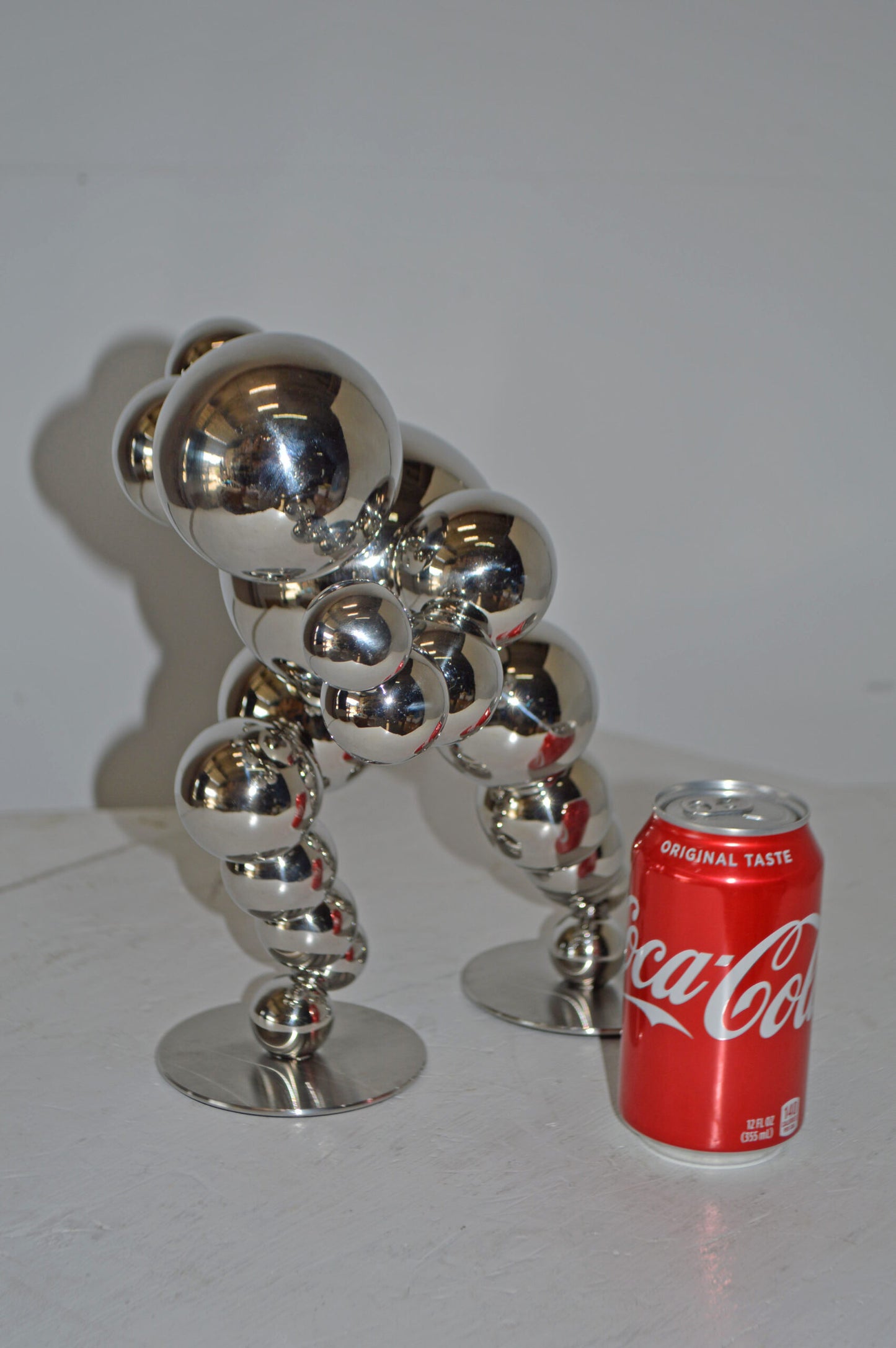 Modern Art Abstract of a Runner made of Chrome Balls - Size: 13"L x 9"W x 11"H.