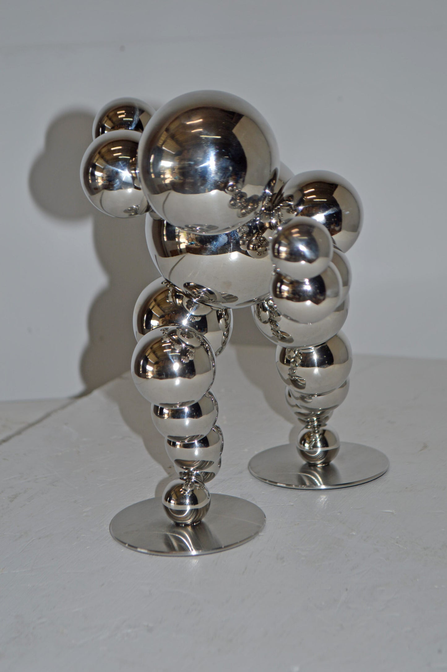 Modern Art Abstract of a Runner made of Chrome Balls - Size: 13"L x 9"W x 11"H.