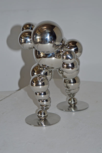 Modern Art Abstract of a Runner made of Chrome Balls - Size: 13"L x 9"W x 11"H.