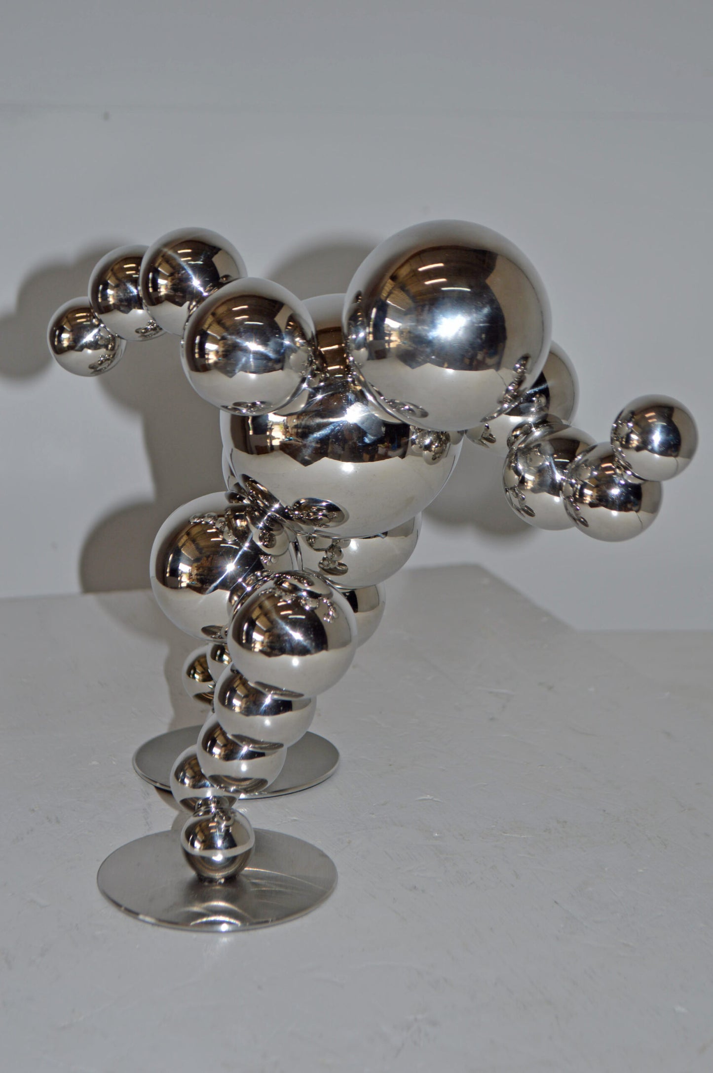 Modern Art Abstract of a Runner made of Chrome Balls - Size: 13"L x 9"W x 11"H.