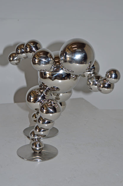 Modern Art Abstract of a Runner made of Chrome Balls - Size: 13"L x 9"W x 11"H.
