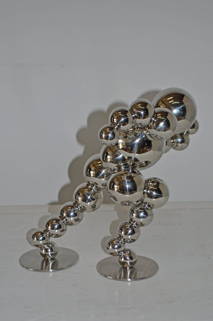Modern Art Abstract of a Runner made of Chrome Balls - Size: 13"L x 9"W x 11"H.
