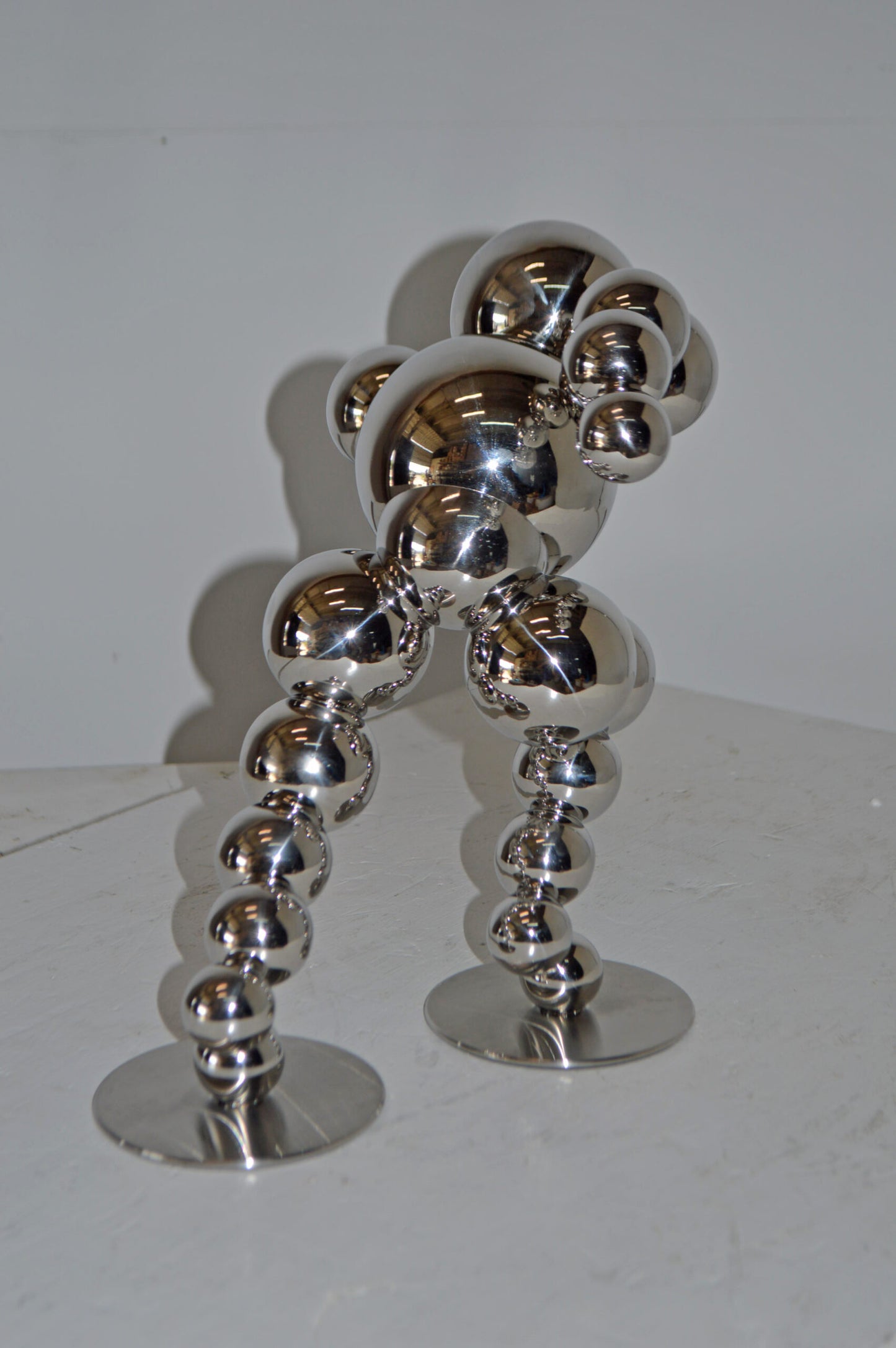 Modern Art Abstract of a Runner made of Chrome Balls - Size: 13"L x 9"W x 11"H.