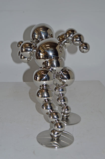 Modern Art Abstract of a Runner made of Chrome Balls - Size: 13"L x 9"W x 11"H.
