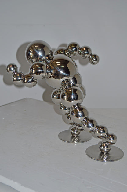 Modern Art Abstract of a Runner made of Chrome Balls - Size: 13"L x 9"W x 11"H.