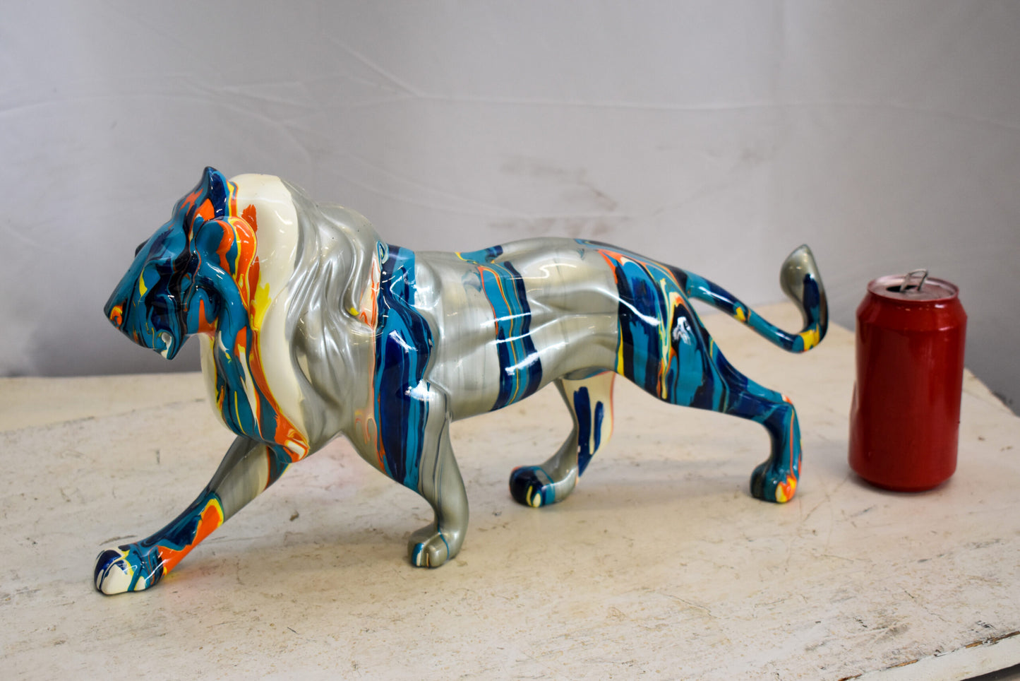 Roaming Multicolored Lion Resin Statue 19" x 5" x 9"H