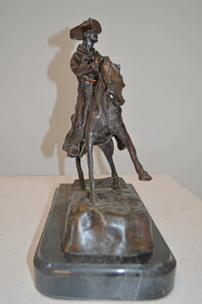 Cowboy, a Frederic Remington Replica Bronze Statue - Size: 14"L x 8"W x 13"H.